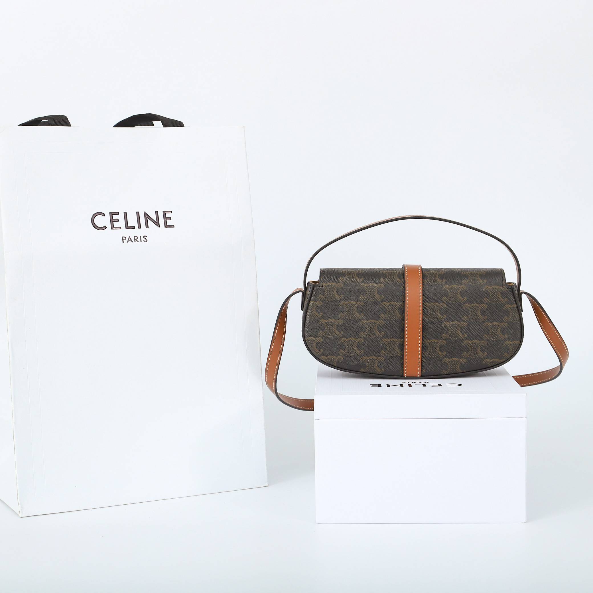 CELINE TABOU logo printed cattle leather sash clutch