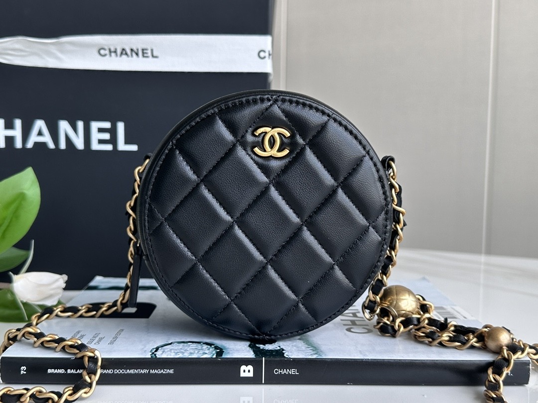 CHANEL metal ball bun bag