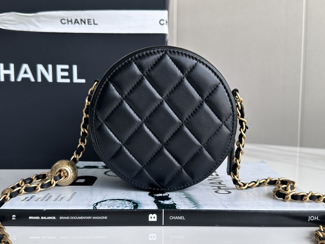 CHANEL metal ball bun bag