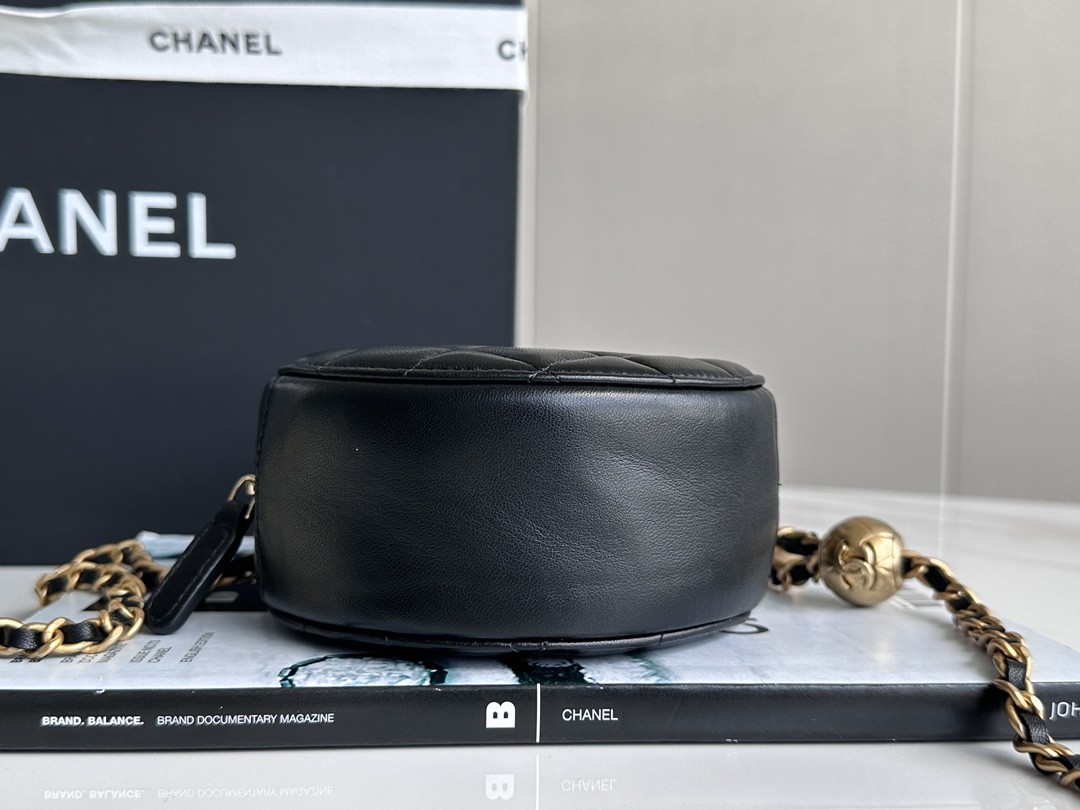 CHANEL metal ball bun bag