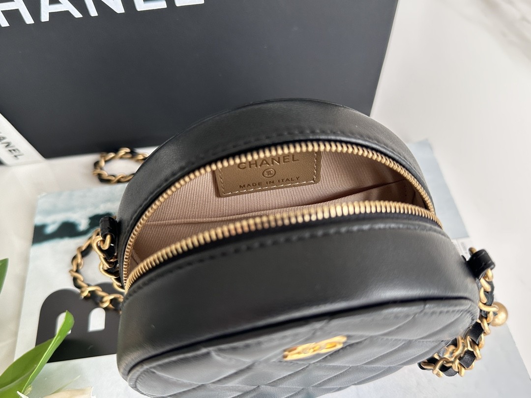 CHANEL metal ball bun bag