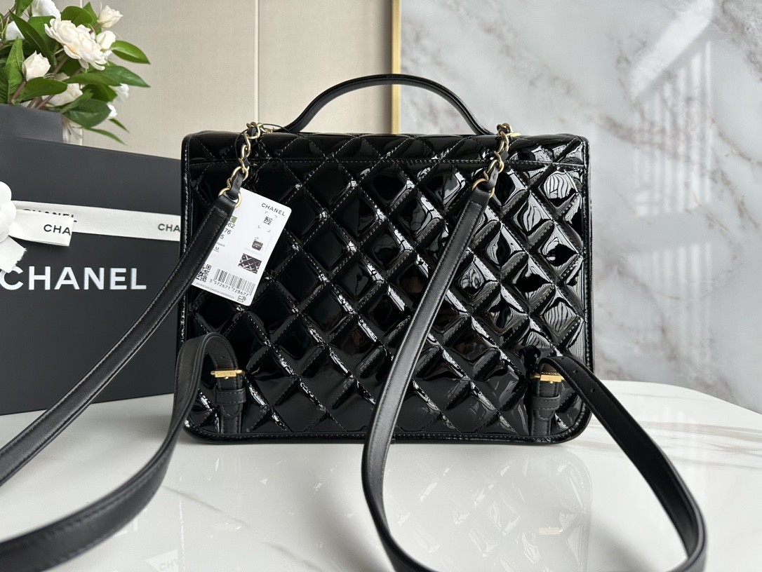 CHANEL 22K patent leather backpack