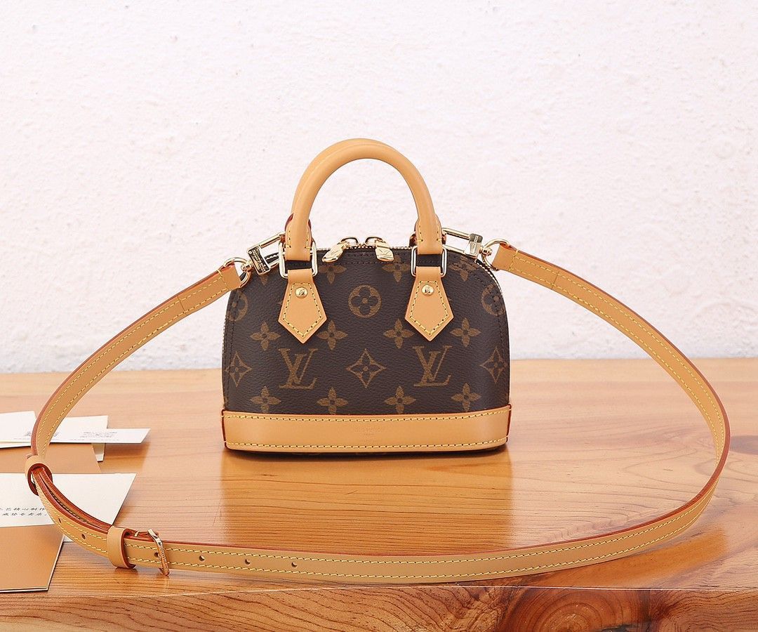 Louis Vuitton NANO ALMA Handbag