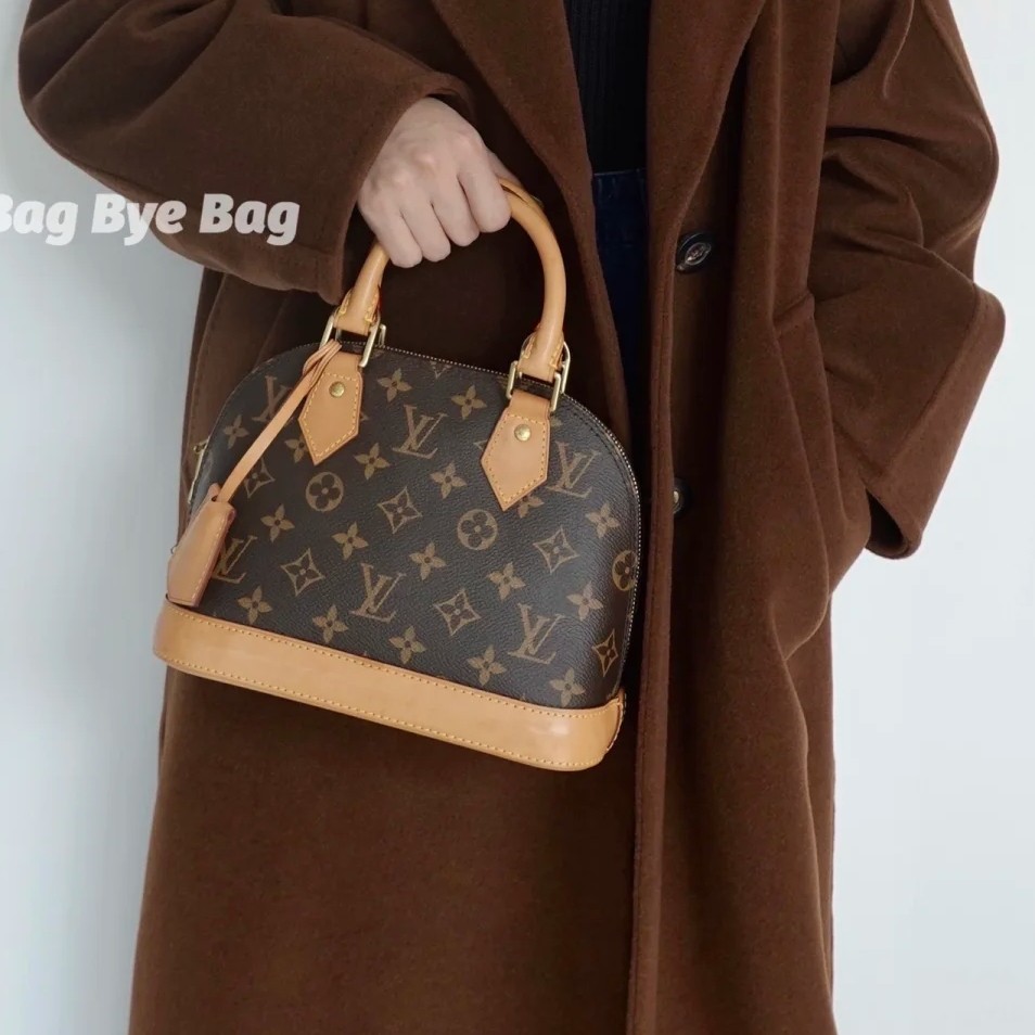 Louis Vuitton ALMA BB Handbag