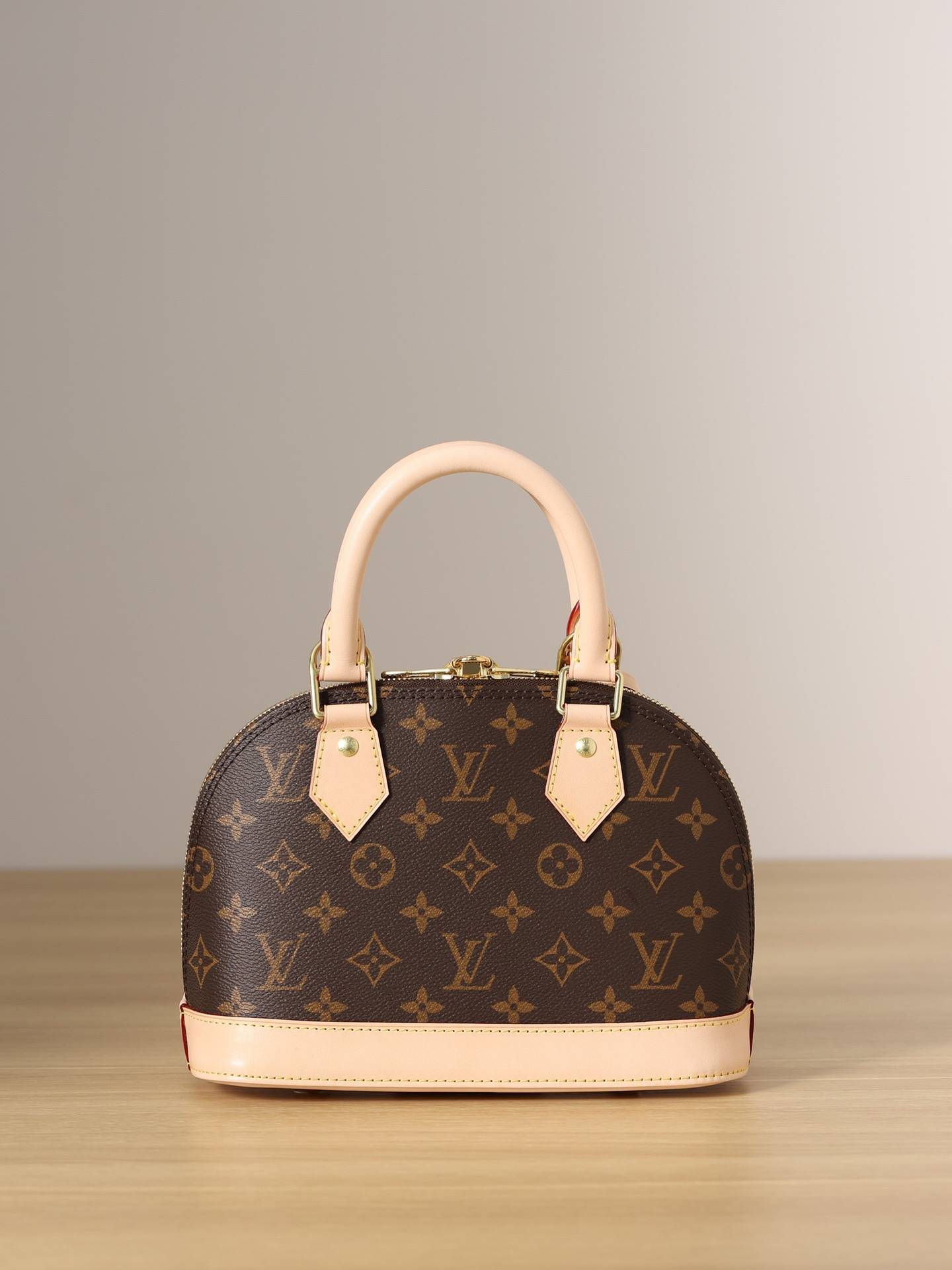 Louis Vuitton ALMA BB Handbag