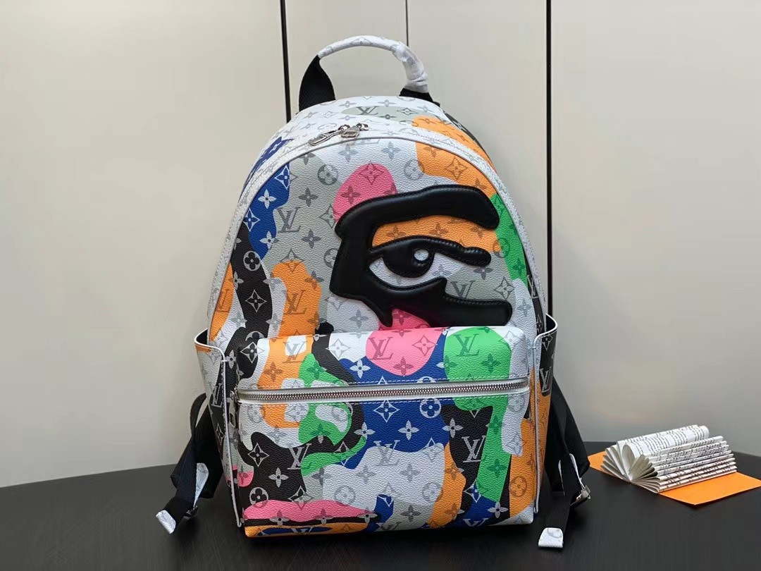 Louis Vuitton DISCOVERY White Eyes small backpack